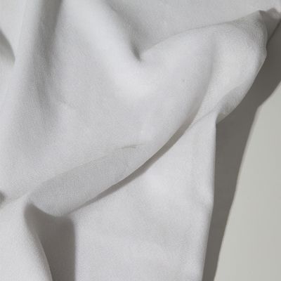 Gaoxin Interlining tejido para prendas de vestir Fusionando 100% de poliéster Tricot Fusible Entretela